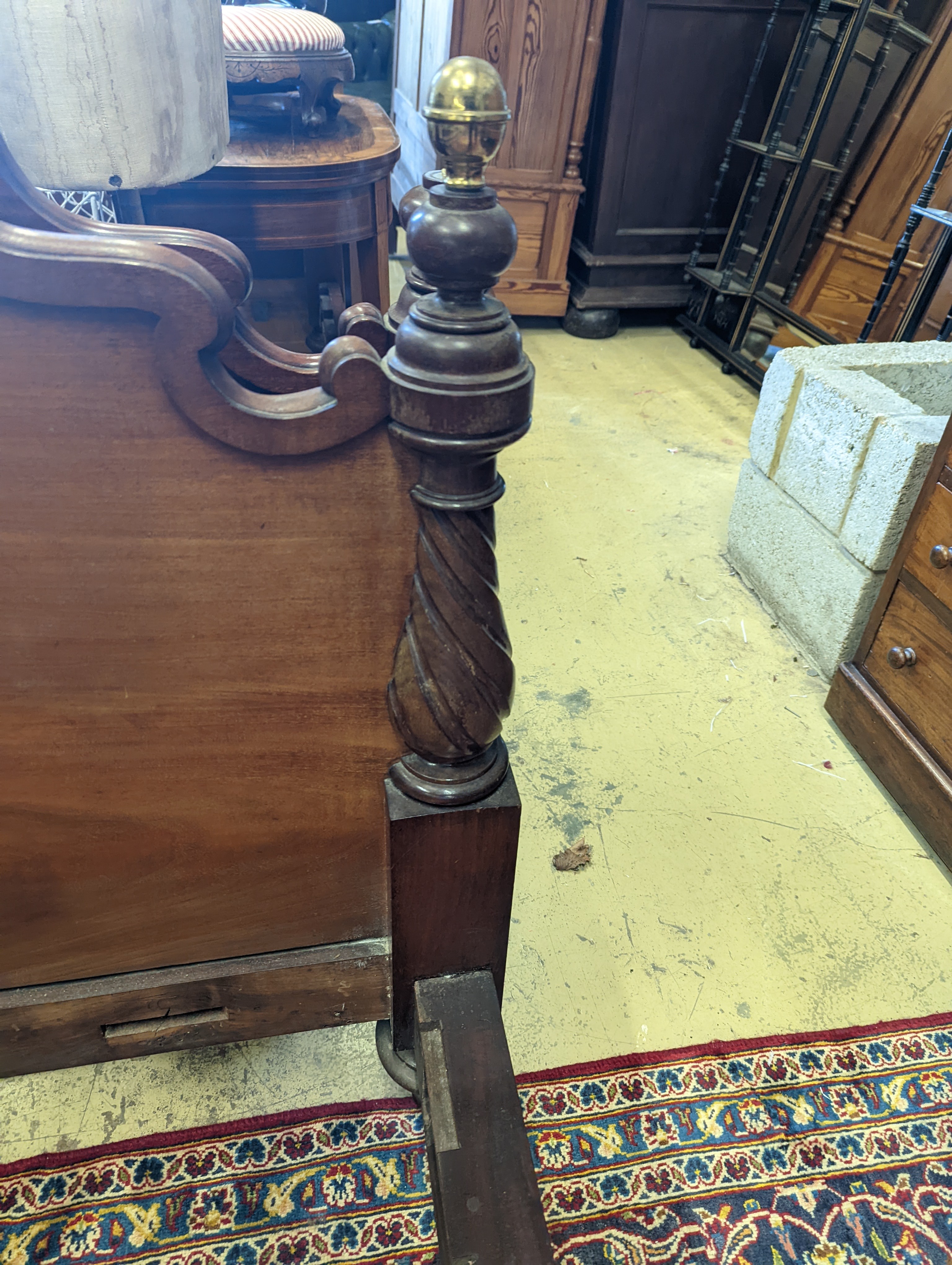 A pair of Victorian mahogany single bed frames, length 210cm, width 107cm